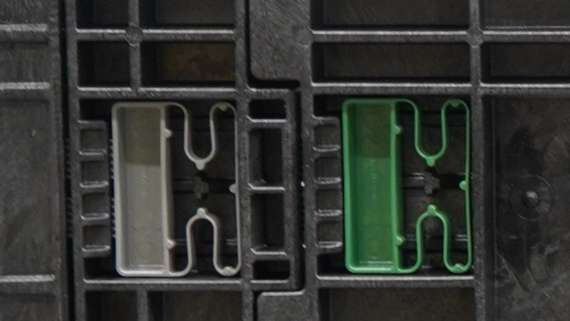 Grey and green latches