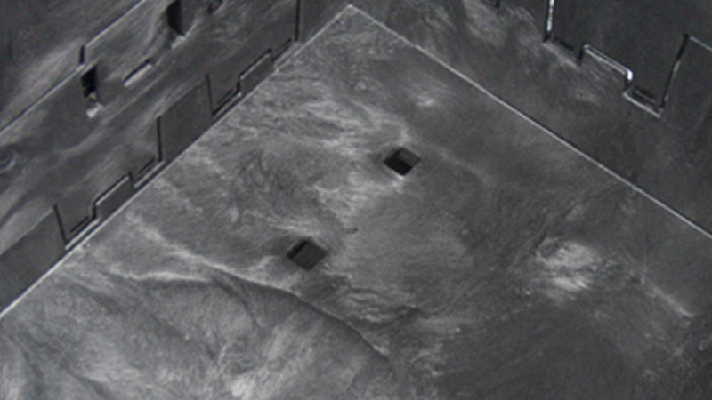 Drain holes in the bulk container floor