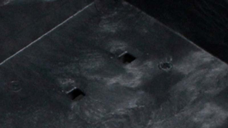 Fixed wall container floor with drain hole